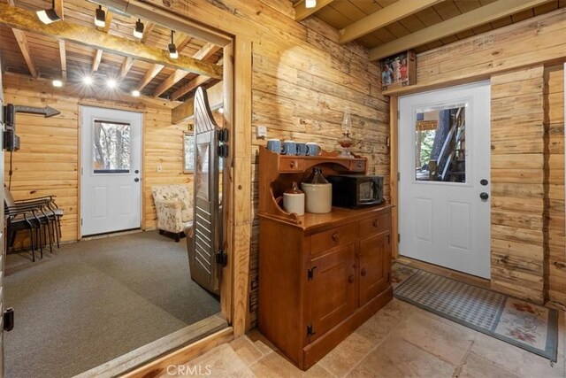 33019 Juniper Ln, Green Valley Lake, CA 92341 - entryway with a wood ceiling with exposed beams and wood walls