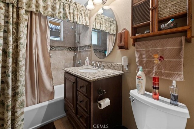 33019 Juniper Ln, Green Valley Lake, CA 92341 - full bathroom featuring shower / bath combination with curtain and vanity
