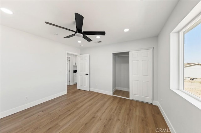 58424 Canterbury St, Yucca Valley, CA 92284 - unfurnished bedroom featuring light wood finished floors, recessed lighting, a closet, and ceiling fan