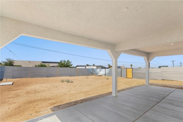 58424 Canterbury St, Yucca Valley, CA 92284 - fenced backyard with a patio area