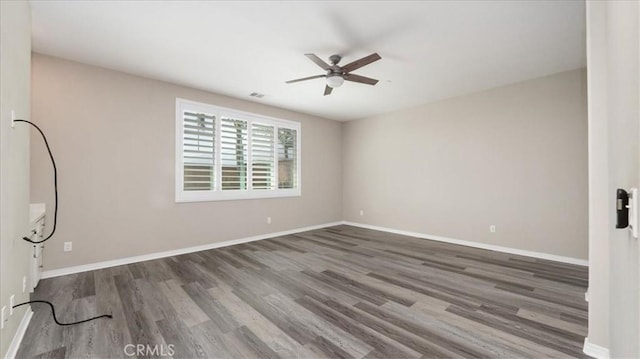 5120 Armendarez Ln, Fontana, CA 92336 - spare room with ceiling fan and wood finished floors
