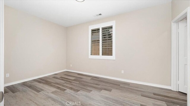5120 Armendarez Ln, Fontana, CA 92336 - unfurnished room with wood finished floors