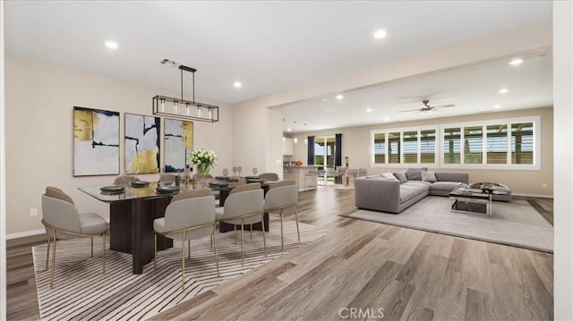 5120 Armendarez Ln, Fontana, CA 92336 - dining area featuring recessed lighting, light wood-type flooring, and a ceiling fan