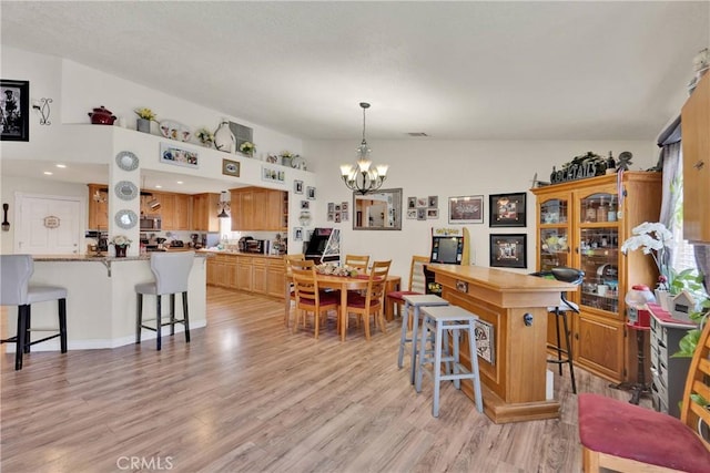26460 Gem Ct, Helendale, CA 92342 - dining space with a chandelier and light wood-type flooring