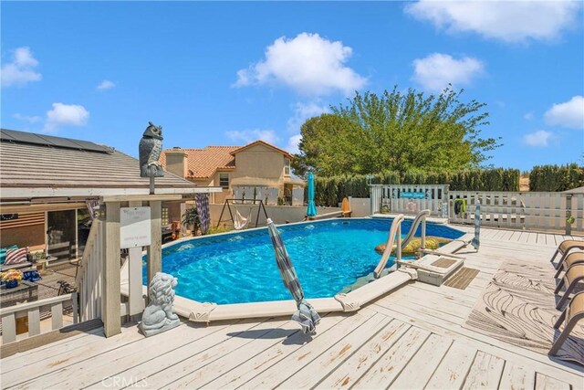 26460 Gem Ct, Helendale, CA 92342 - view of swimming pool featuring a wooden deck