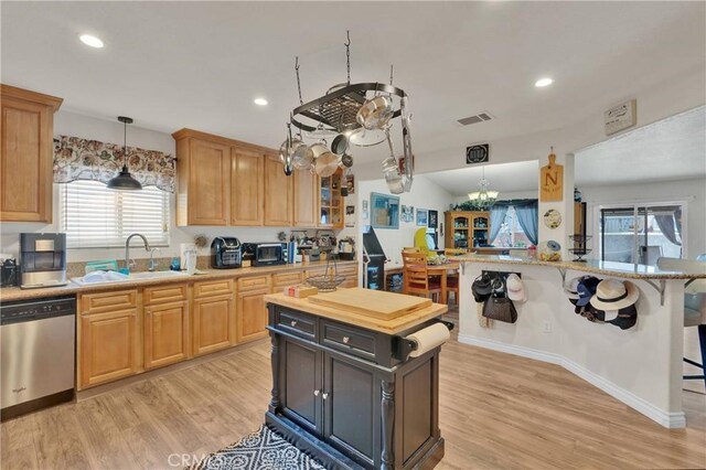 26460 Gem Ct, Helendale, CA 92342 - kitchen featuring stainless steel dishwasher, a chandelier, light countertops, light wood finished floors, and recessed lighting