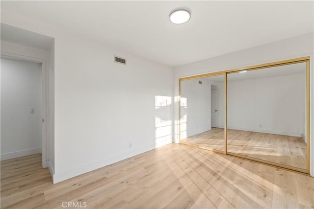 24135 Las Naranjas Dr, Laguna Niguel, CA 92677 - unfurnished bedroom with wood finished floors and a closet