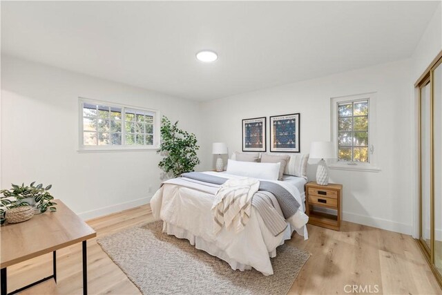 24135 Las Naranjas Dr, Laguna Niguel, CA 92677 - bedroom featuring light wood-style flooring and a closet