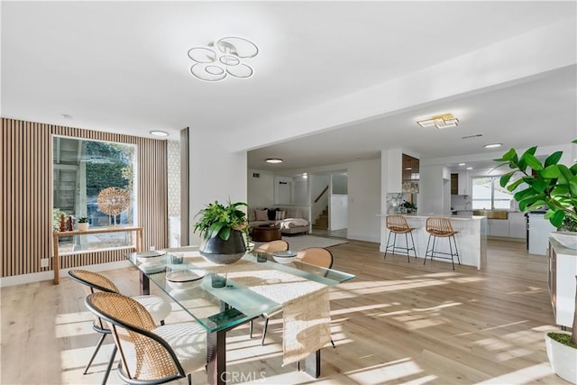 24135 Las Naranjas Dr, Laguna Niguel, CA 92677 - dining space with stairs and light wood finished floors