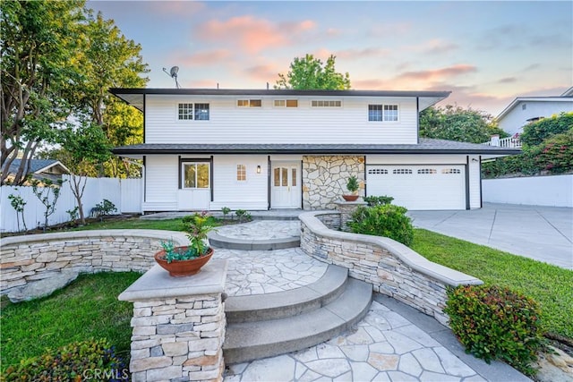 24135 Las Naranjas Dr, Laguna Niguel, CA 92677 - view of front of property featuring concrete driveway, a garage, and french doors