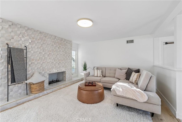 24135 Las Naranjas Dr, Laguna Niguel, CA 92677 - living area featuring a large fireplace and wood finished floors