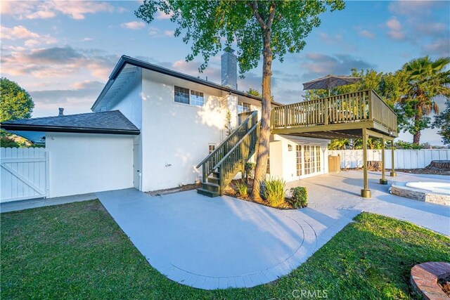 24135 Las Naranjas Dr, Laguna Niguel, CA 92677 - rear view of property featuring a patio, stairs, a deck, and a chimney