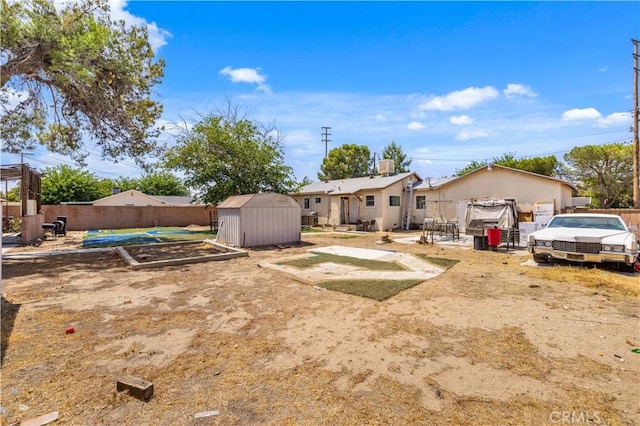 1022 E Lancaster Blvd, Lancaster, CA 93535 - view of yard featuring a shed, a garden, and a patio