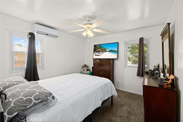 1022 E Lancaster Blvd, Lancaster, CA 93535 - bedroom featuring a wall unit AC, dark colored carpet, and a ceiling fan