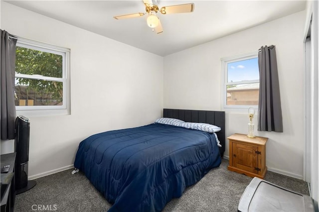 1022 E Lancaster Blvd, Lancaster, CA 93535 - carpeted bedroom featuring baseboards and a ceiling fan