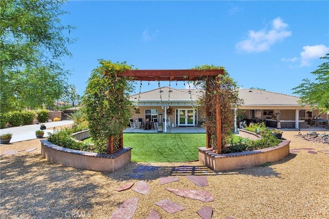 19420 Red Feather Rd, Apple Valley, CA 92307 - back of property with french doors, a patio area, and a yard