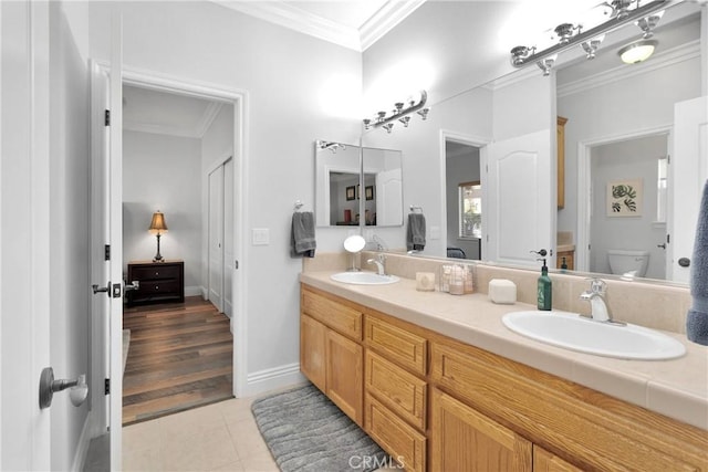19420 Red Feather Rd, Apple Valley, CA 92307 - full bath featuring ornamental molding, double vanity, and tile patterned floors
