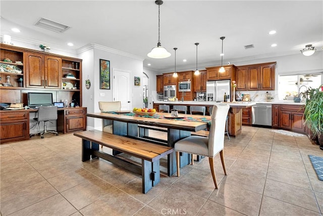 19420 Red Feather Rd, Apple Valley, CA 92307 - dining room featuring recessed lighting, built in desk, crown molding, and light tile patterned floors
