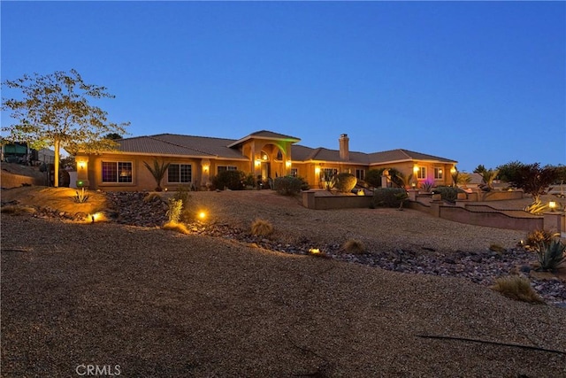 19420 Red Feather Rd, Apple Valley, CA 92307 - back of house featuring stucco siding