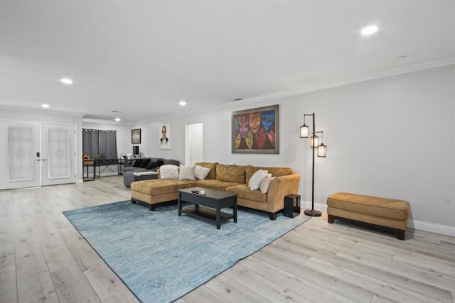 4903 Deeboyar Ave, Lakewood, CA 90712 - living area with ornamental molding, recessed lighting, and light wood-style flooring
