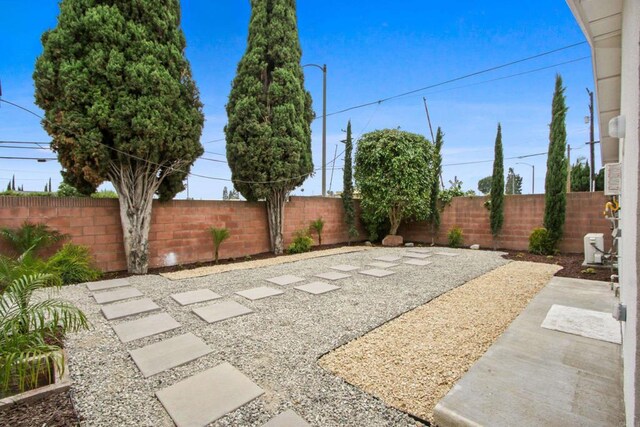 4903 Deeboyar Ave, Lakewood, CA 90712 - fenced backyard with a patio