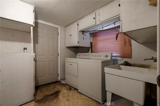 707 Marin St, Corning, CA 96021 - laundry area with cabinet space and washer and clothes dryer