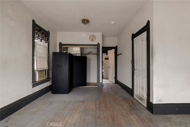 707 Marin St, Corning, CA 96021 - unfurnished bedroom with hardwood / wood-style floors and baseboards