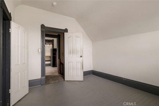 707 Marin St, Corning, CA 96021 - bonus room featuring lofted ceiling and wood finished floors
