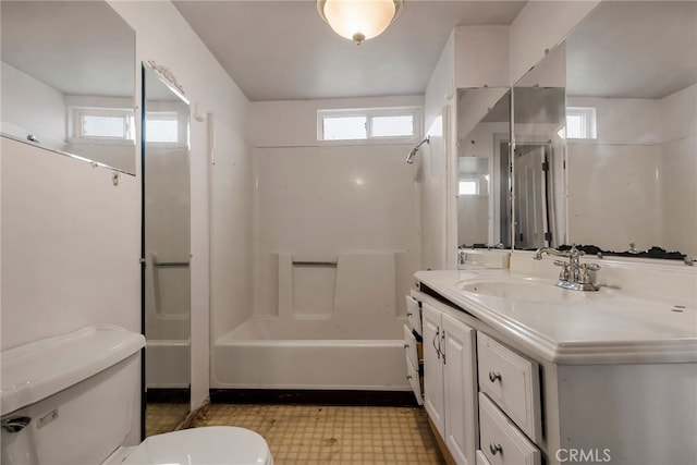 707 Marin St, Corning, CA 96021 - full bath with vanity, shower / washtub combination, plenty of natural light, and tile patterned floors