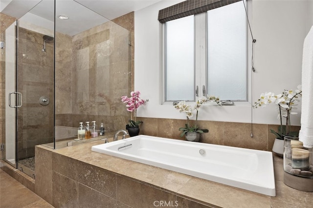 5390 Carlsbad Blvd, Carlsbad, CA 92008 - full bathroom with a bath, a stall shower, and recessed lighting