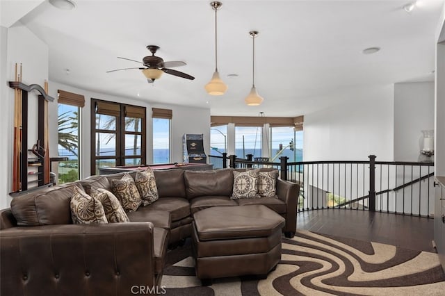 5390 Carlsbad Blvd, Carlsbad, CA 92008 - living room with wood finished floors, ceiling fan, and pool table