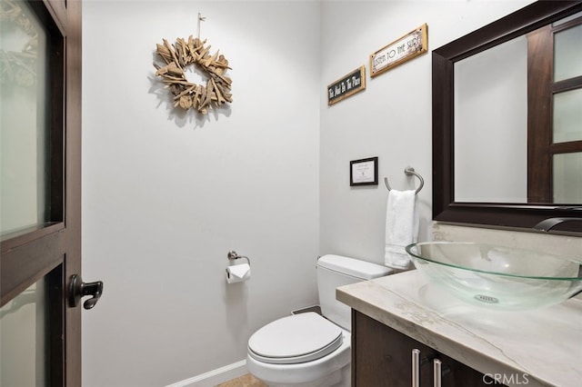 5390 Carlsbad Blvd, Carlsbad, CA 92008 - half bathroom with toilet and vanity