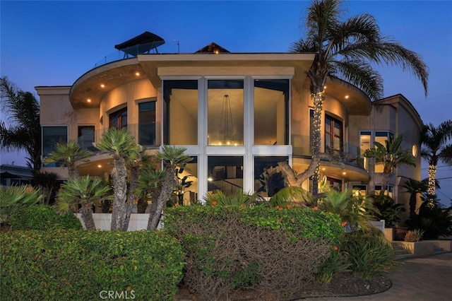 5390 Carlsbad Blvd, Carlsbad, CA 92008 - back of property with stucco siding and a balcony
