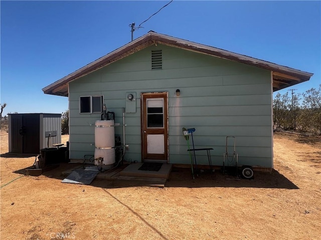 1489 Balsa Ave, Yucca Valley, CA 92284 - back of property featuring a storage unit