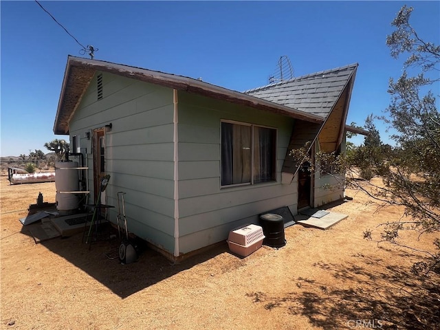 1489 Balsa Ave, Yucca Valley, CA 92284 - view of property exterior with a shingled roof