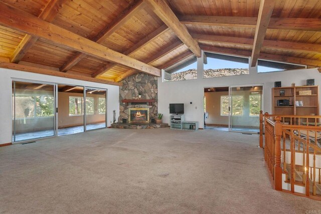 46920 Rainbow Canyon Rd, Temecula, CA 92592 - unfurnished living room with a wood ceiling with exposed beams, a fireplace, carpet floors, high vaulted ceiling, and plenty of natural light