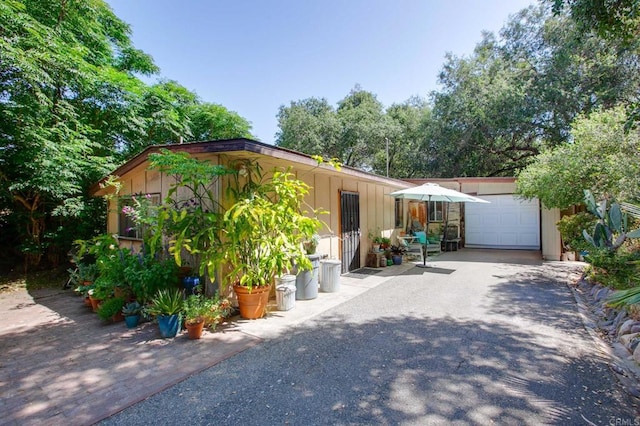 46920 Rainbow Canyon Rd, Temecula, CA 92592 - view of front of home with asphalt driveway and an attached garage