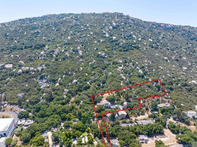 46920 Rainbow Canyon Rd, Temecula, CA 92592 - aerial overview of property's location with property parcel outlined and mountains