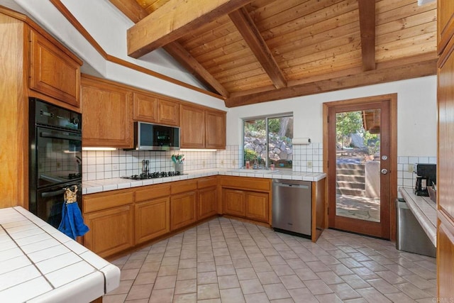 46920 Rainbow Canyon Rd, Temecula, CA 92592 - kitchen featuring stainless steel appliances, wooden ceiling, backsplash, tile counters, and brown cabinetry