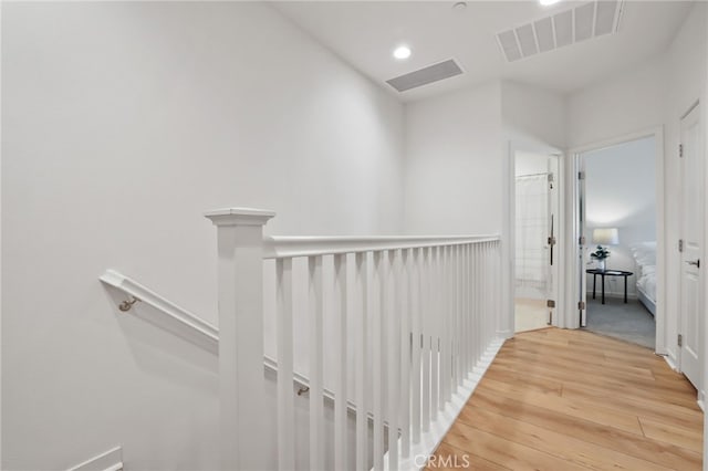 305 Blackrock, Lake Forest, CA 92610 - hall featuring an upstairs landing, wood finished floors, and recessed lighting