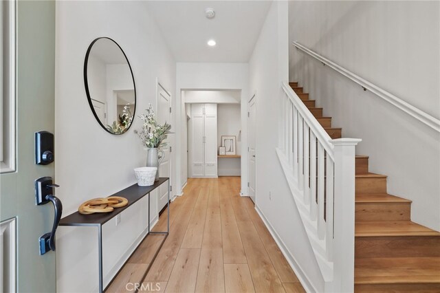 305 Blackrock, Lake Forest, CA 92610 - foyer with stairway, light wood finished floors, and recessed lighting