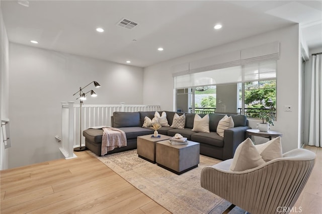 305 Blackrock, Lake Forest, CA 92610 - living area featuring light wood-style floors and recessed lighting