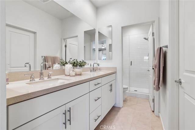 305 Blackrock, Lake Forest, CA 92610 - bathroom with double vanity, a stall shower, and tile patterned flooring