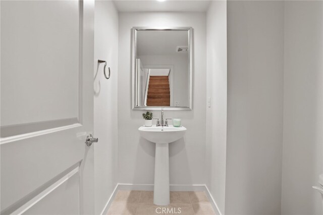 305 Blackrock, Lake Forest, CA 92610 - half bath featuring baseboards and tile patterned floors