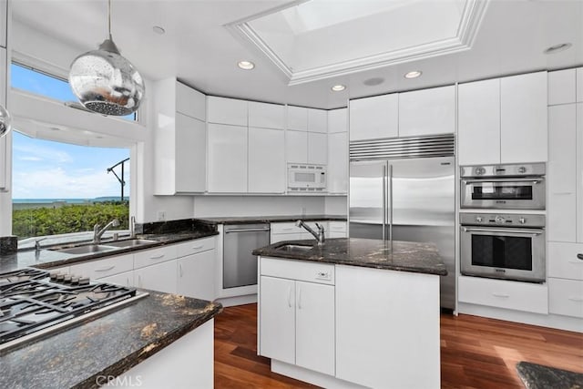 2016 Calle De Los Alamos, San Clemente, CA 92672 - kitchen with appliances with stainless steel finishes, plenty of natural light, recessed lighting, and white cabinetry