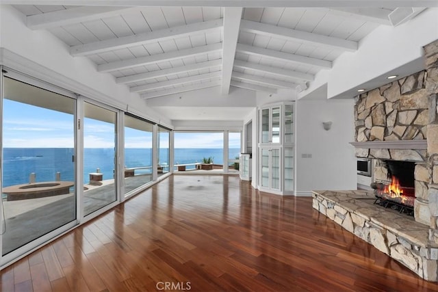 2016 Calle De Los Alamos, San Clemente, CA 92672 - unfurnished living room with hardwood / wood-style floors, a fireplace, a water view, and wooden ceiling