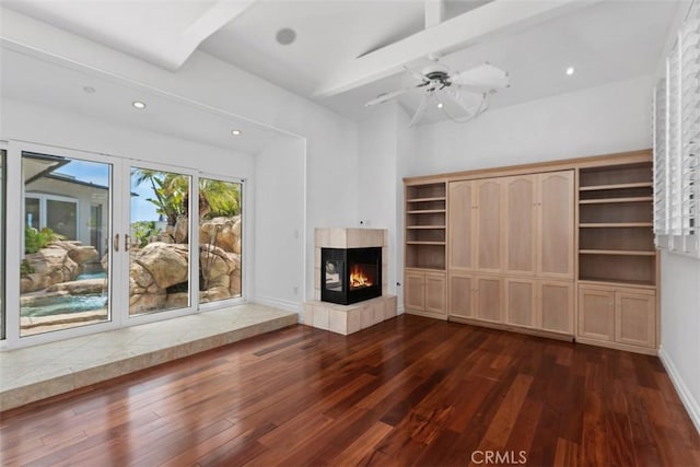 2016 Calle De Los Alamos, San Clemente, CA 92672 - unfurnished living room with dark wood-style flooring, a tiled fireplace, recessed lighting, and ceiling fan