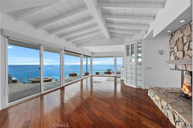 2016 Calle De Los Alamos, San Clemente, CA 92672 - living room featuring hardwood / wood-style floors, a fireplace, a water view, and plenty of natural light