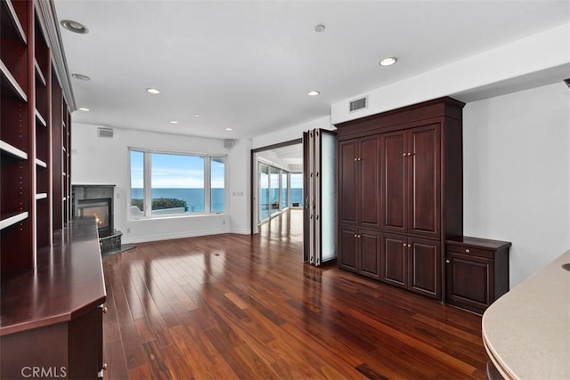 2016 Calle De Los Alamos, San Clemente, CA 92672 - unfurnished living room with dark wood-type flooring, a high end fireplace, and recessed lighting