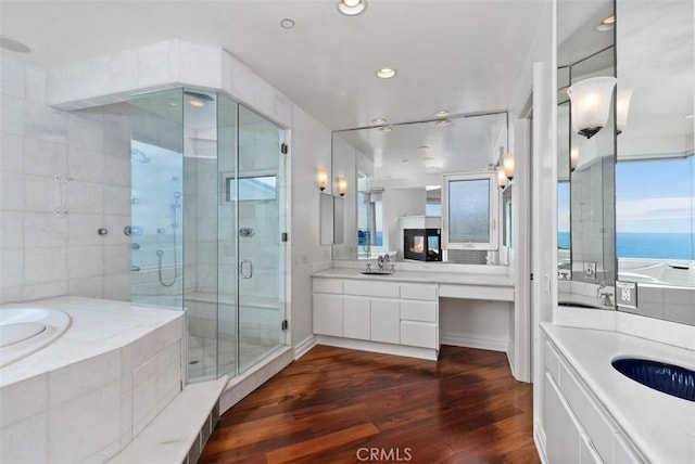 2016 Calle De Los Alamos, San Clemente, CA 92672 - full bathroom with wood finished floors, vanity, a garden tub, a stall shower, and recessed lighting
